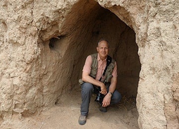photo of Crawford in a cave