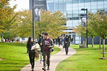 Students walking along a path at the U of T's Scarborough campus.