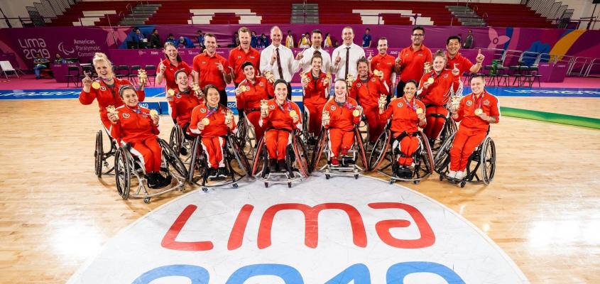 Erica Gavel poses with her teammates after qualifying for 2020 Tokyo Paralympic Games