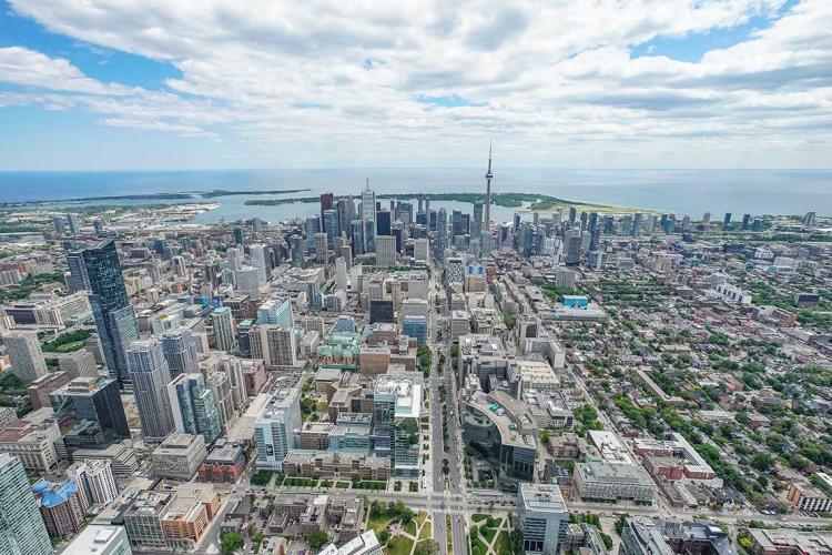 Aerial view of downtown toronto and the CN Tower looking towards the lake