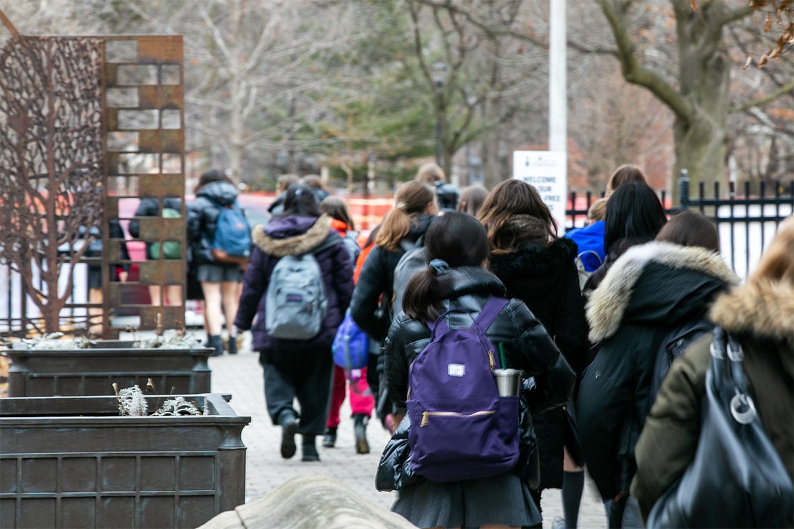 Students walking through U of T's St. George campus