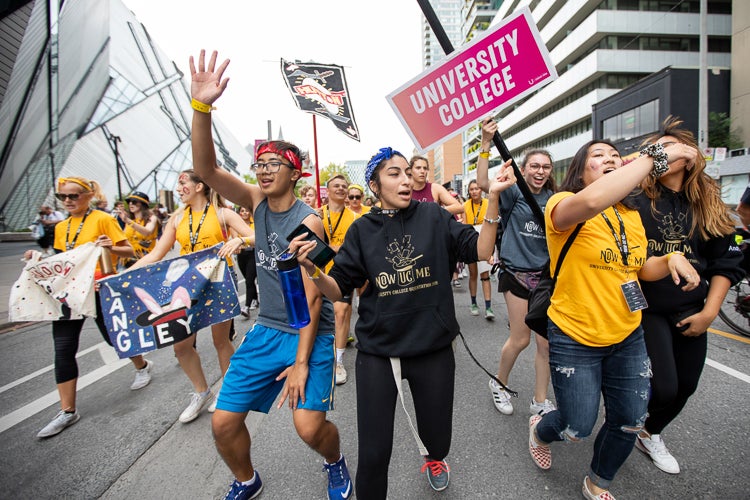 Students from University College during the tri-campus parade along Bloor Street