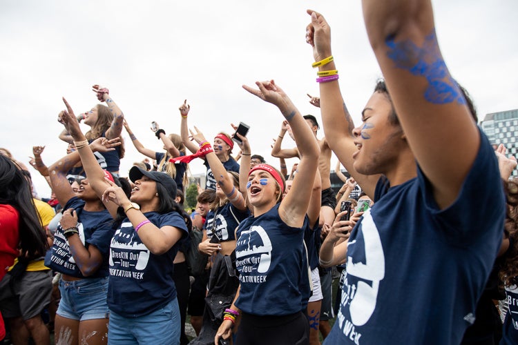 Students from the Faculty of Kinesiology & Physical Education during the cheer-off in Varsity Stadium at the University of Toronto