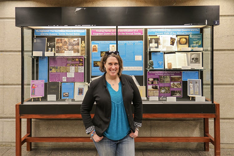 Tracy Spurrier in front a display of her research 