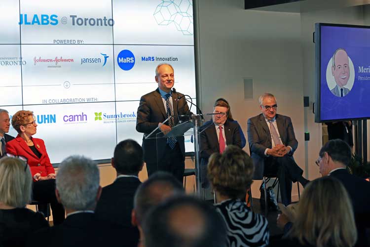 photo of Meric Gertler at lectern