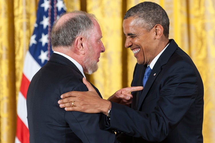 photo of U.S.  President Obama presenting Putnam with a medal