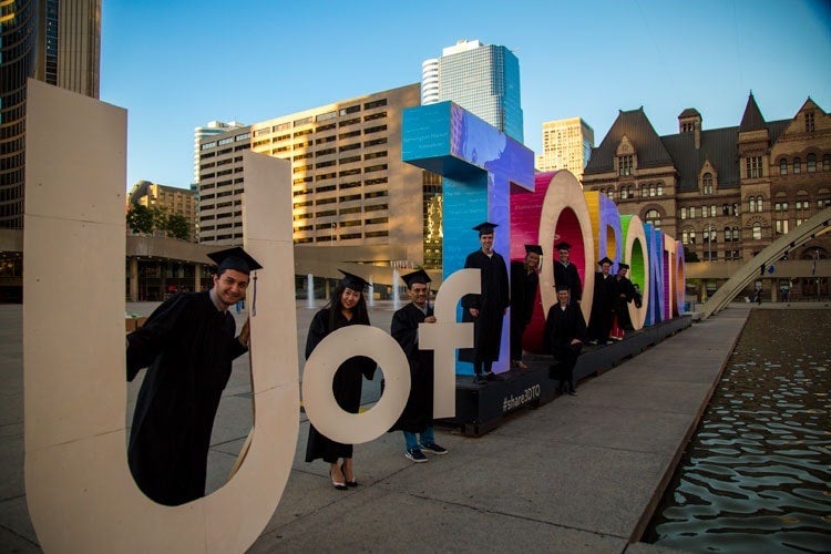 photo of Toronto sign and grads