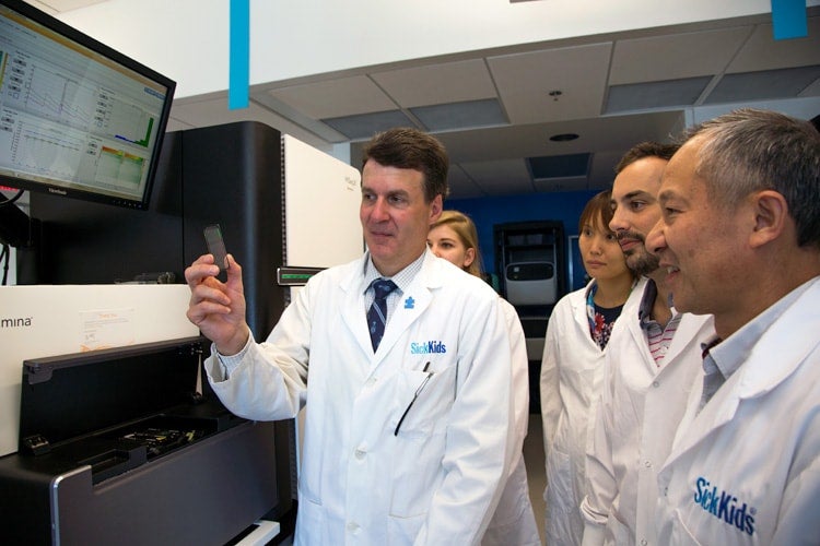 photo of Scherer with researchers