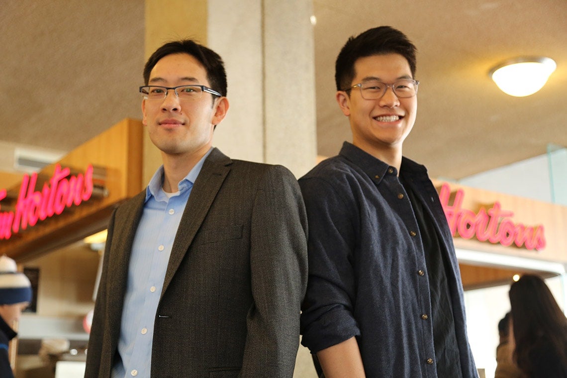 Photo of Timothy Chan and student