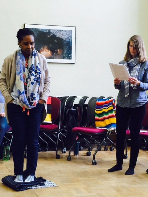 photo of two people doing blanket exercise