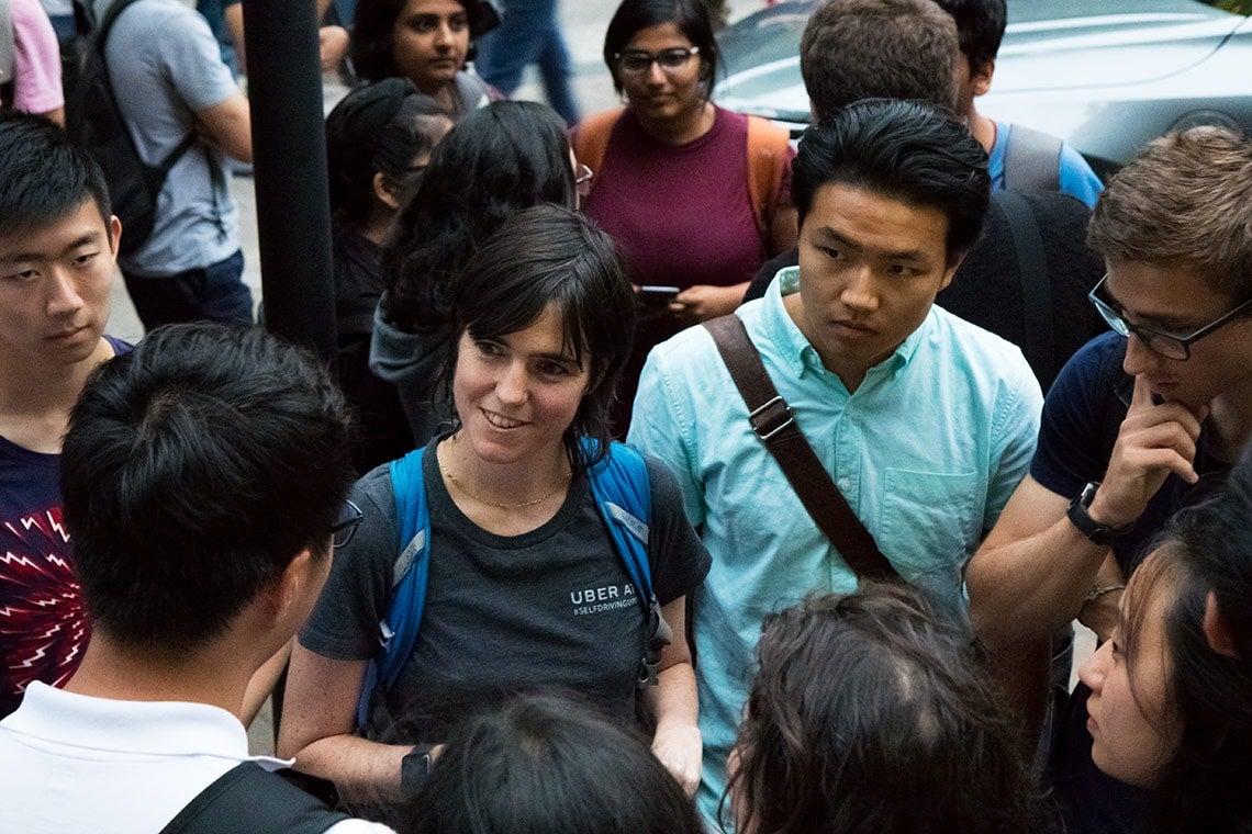 photo of Raquel Urtasun surrounded by students