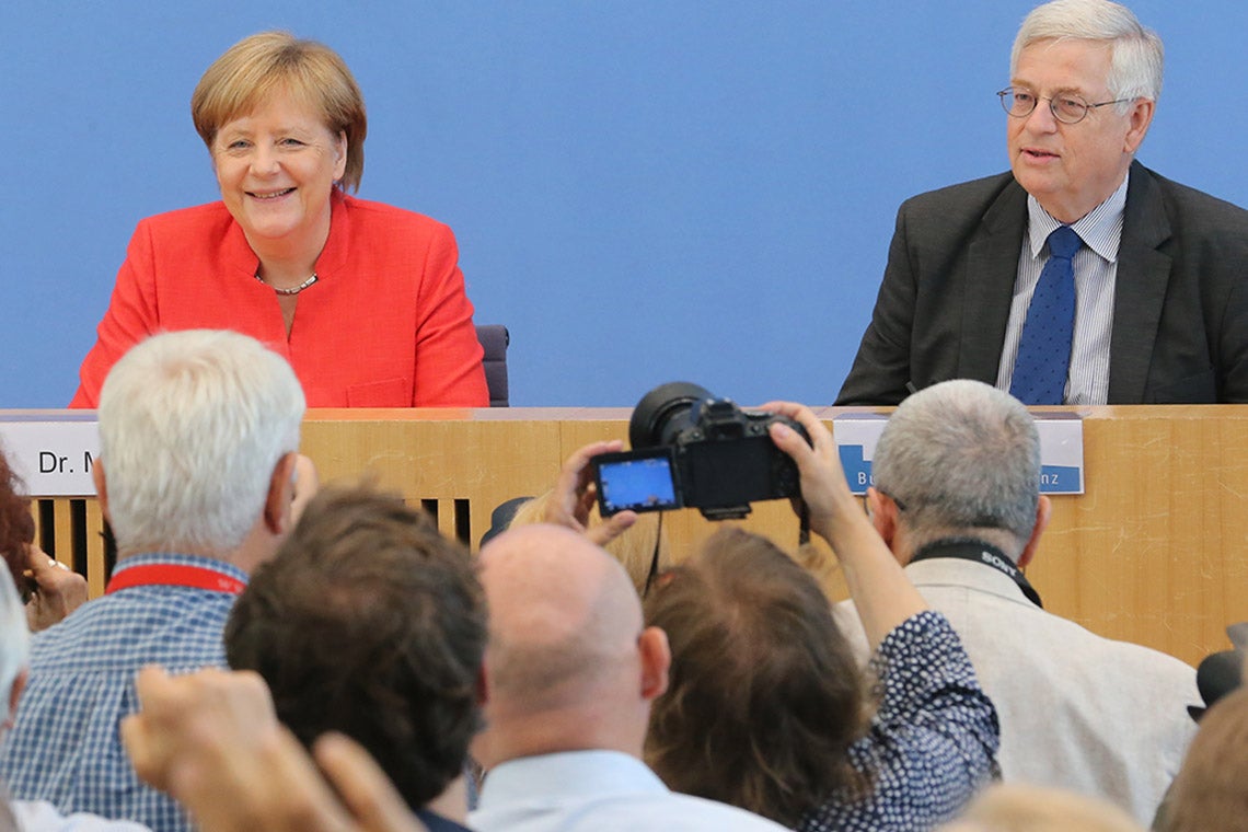 Photo of Angela Merkel and Gregor Mayntz