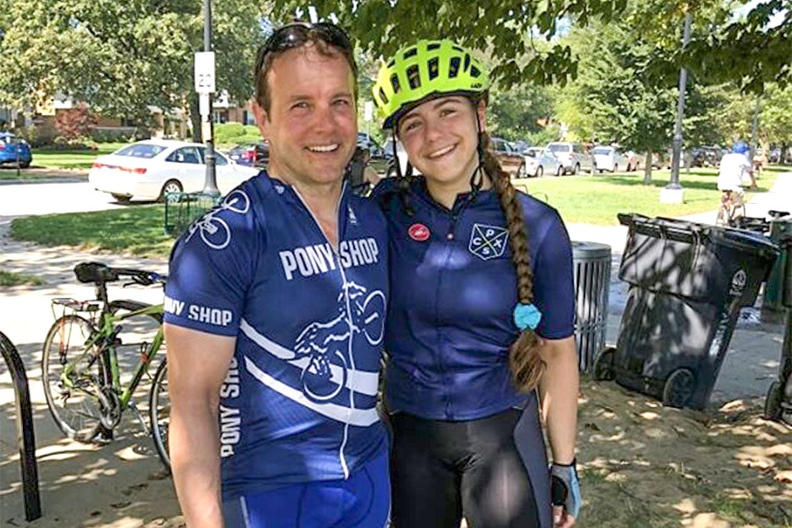 Carlin Kenikoff with her father Troy in bike attire photographed in Wisconsin en route to Toronto