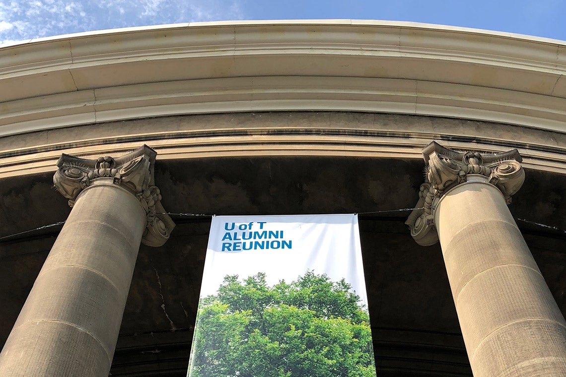 Photo of alumni reunion banner hanging from Convocation Hall