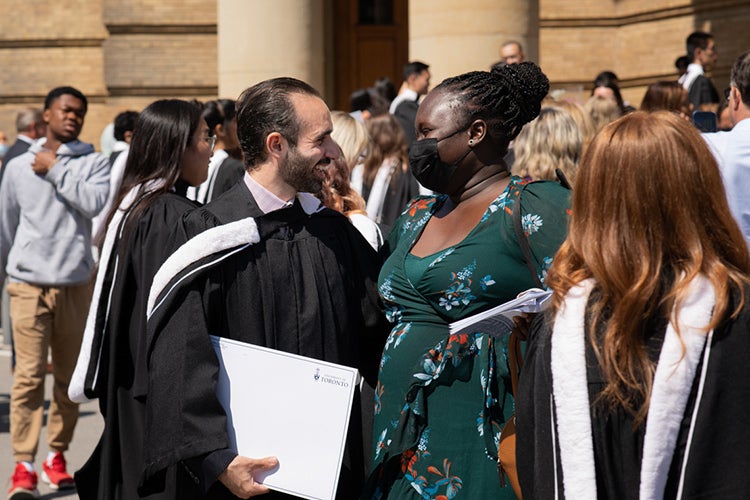 Grads share a moment at Convocation