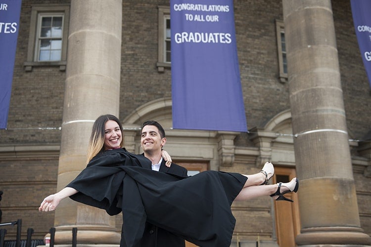 Couple in front of Con Hall