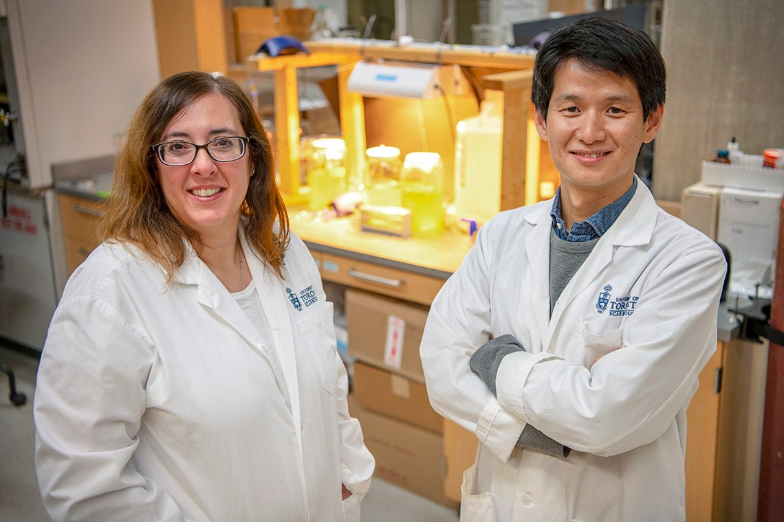 portrait of Professor Myrna Simpson and postdoctoral fellow Tae-Yong Jeong in a lab