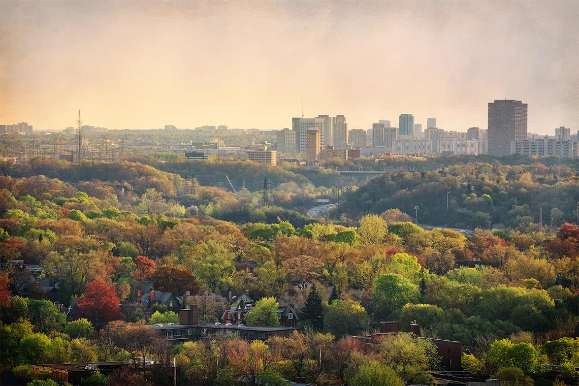 Don Valley in Toronto looking northwards. Fall foliage is visible and there is haze in the air