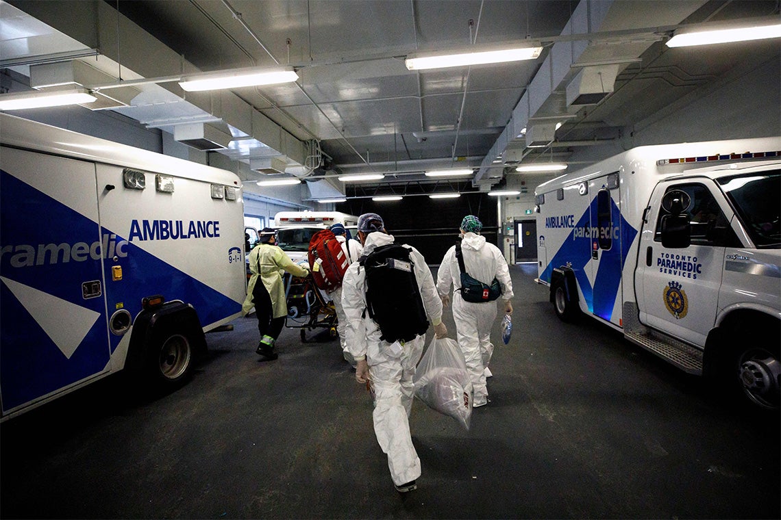 paramedics walking out of a Toronto ambulance bay
