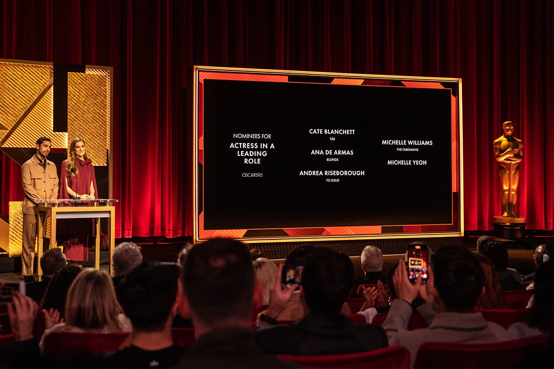 Actors Riz Ahmed, left, and Allison Williams announce the nominations for the 2023 Academy Awards
