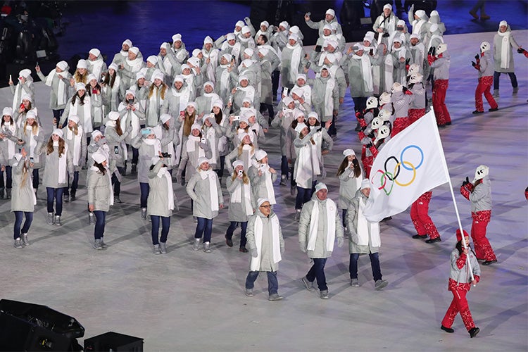 Olympic Atheletes from Russia are led by the Olympic flag during the opening ceremonies of the 2018 pyeongchang olympic winter games