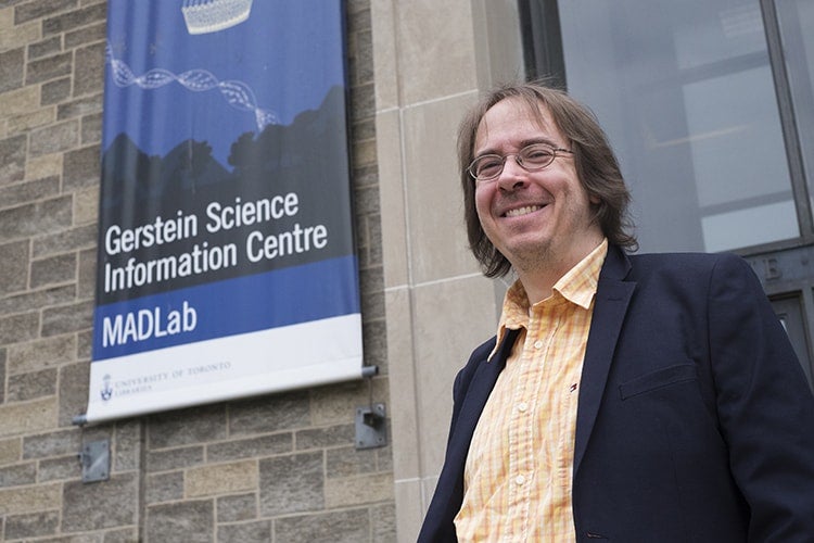 Ian Dennis Miller photo in front of Gerstein library