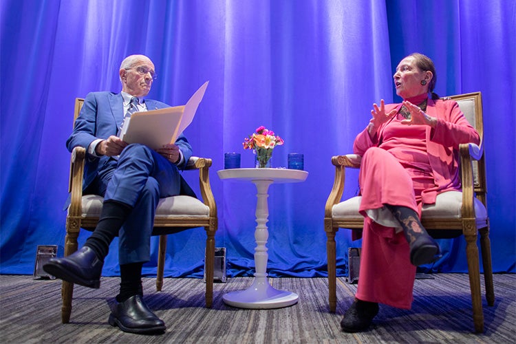 Frank Iacobucci speaks with Rosalie Abella on stage at the Jackman Law building