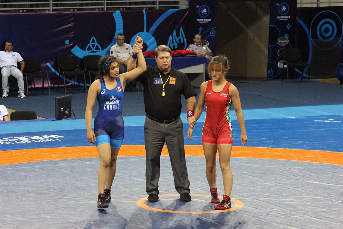 photo of Kirti Saxena at a wrestling match