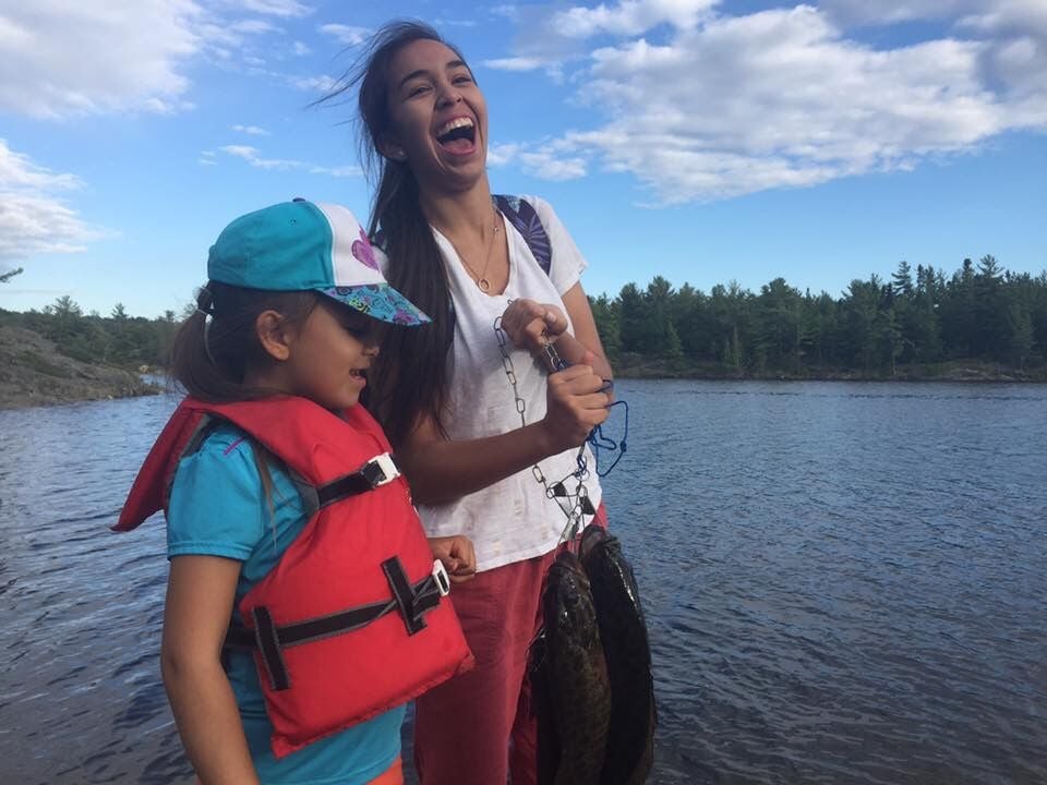 Symone and sister fishing