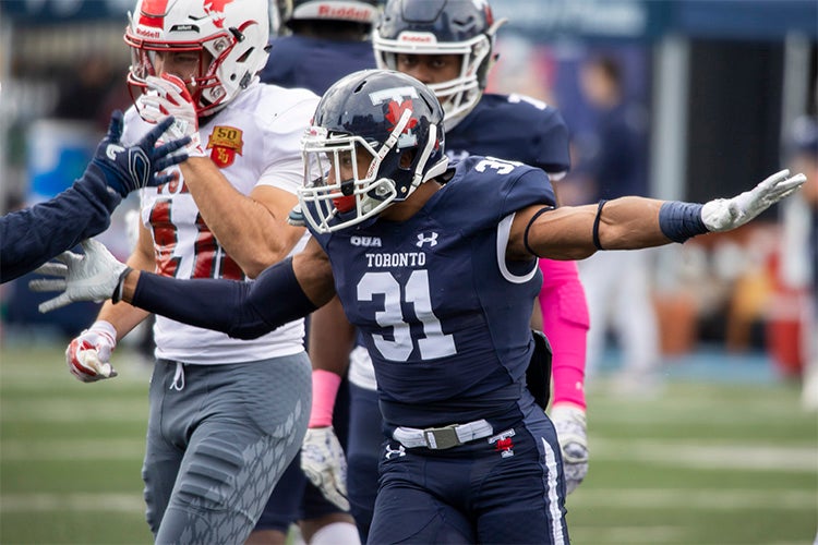 A member of the Varsity Blues football team during a game