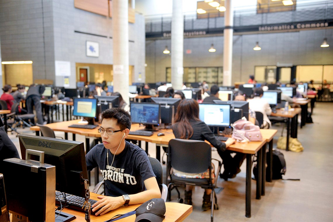 Photo of students at work in library