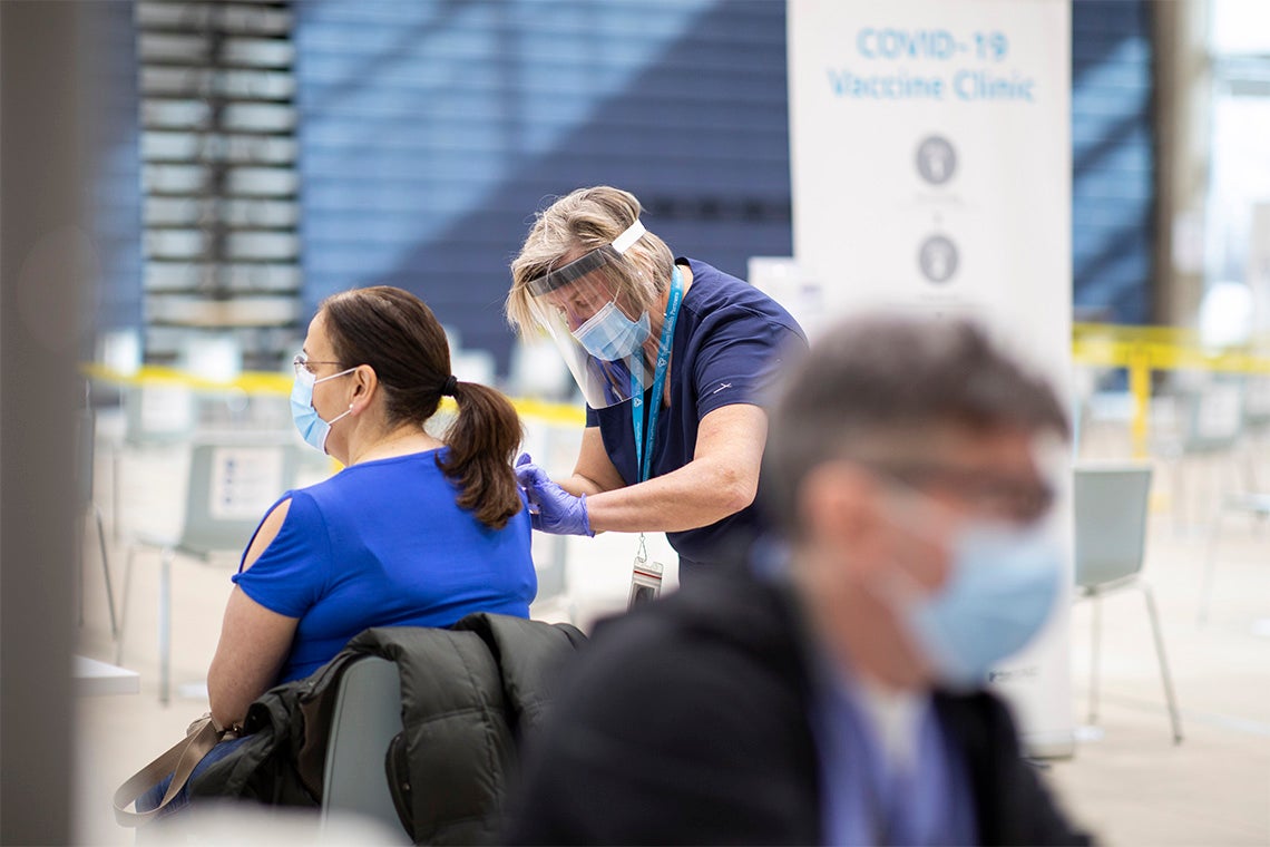 A person receives their covid-19 vaccination at the UTM vaccine clinic