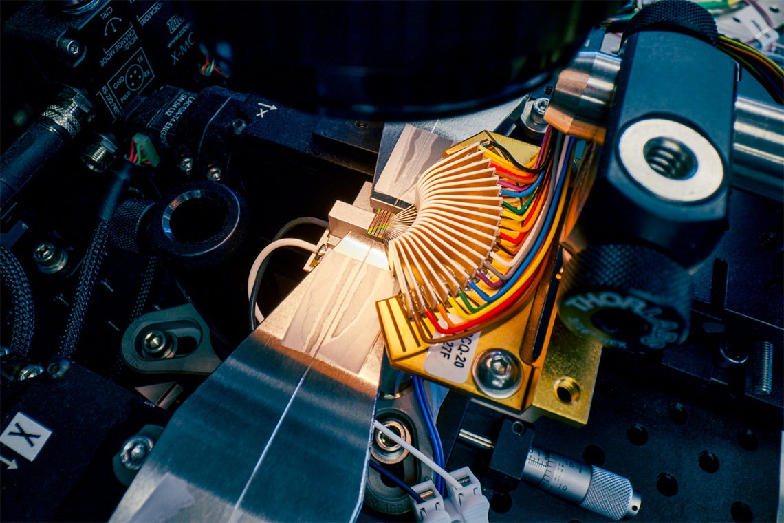 A close up of one of Xanadu's chips on a test bench