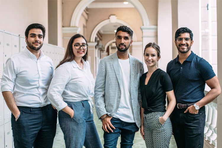 U of T's DVC working group pictured at the Hong Kong summit. (From left) George Ghabrial, Sara Bolourchian, Amitpal Singh, Milica Pavlovic and Aaqib Mahmood (photo by Alice Tse)