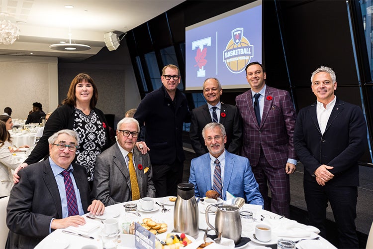 Meric Gertler and Nick Nurse with at the table