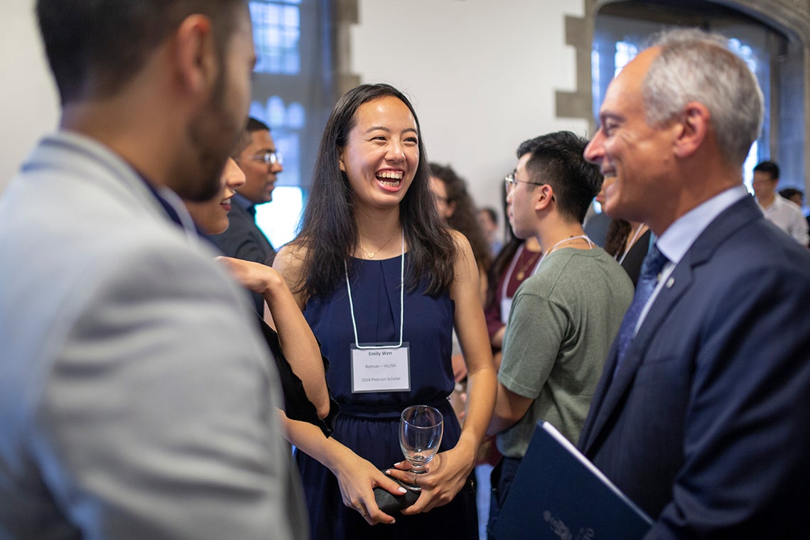 Pearson Scholar laughing with Meric Gertler
