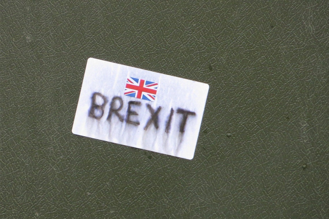 luggage tag with United Kingdom flag and "Brexit" written below it