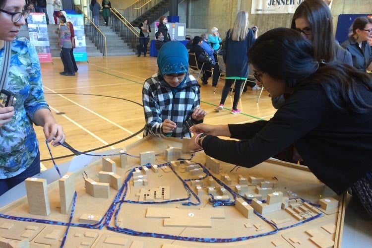 People look at scale models of Thorncliffe Park redevelopment plans (all photos by Aseem Inam)