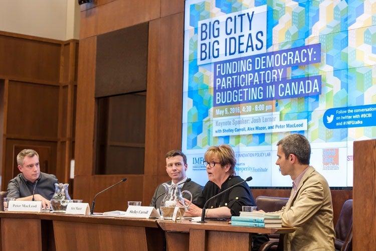 Panel members in discussion