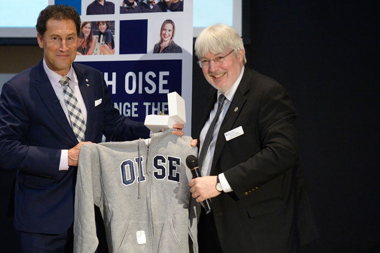 photo of OISE dean Glen Jones with U of T alumnus Steve Paikin