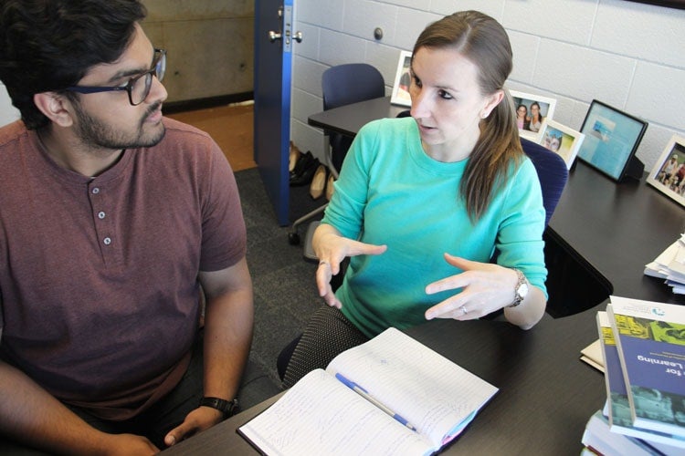 Undergraduate student Darrin Wijeyaratnam with Assistant Professor Ashley Stirling
