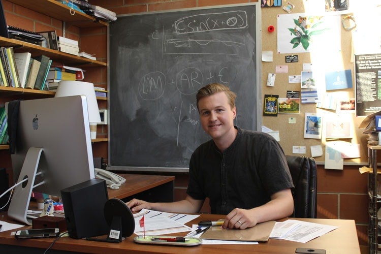 Scott MacIvor at his desk