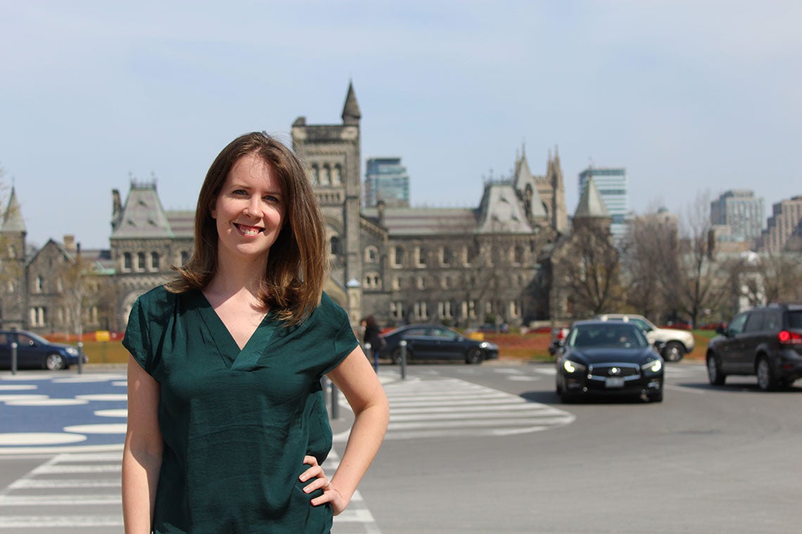 Photo of Katie Fraser posing in front of King's College Circle
