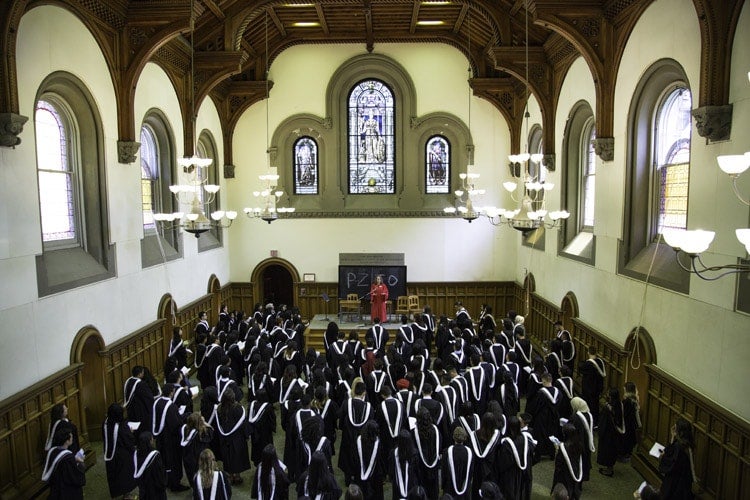 Graduates gather before the procession