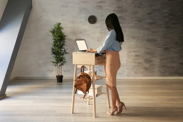 Picture of woman standing at desk