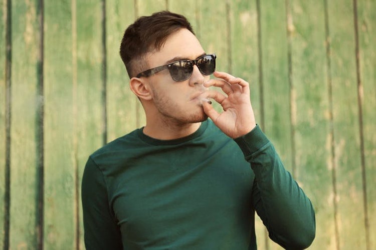 Photo of man smoking marijuana