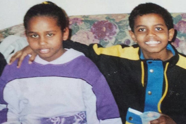 Photo of Abdoul Abdi (at right)