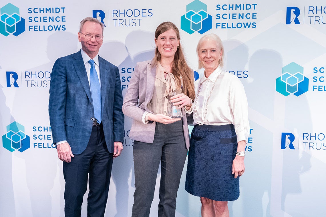 Ina Anreiter at a ceremony with Eric and Wendy Schmidt