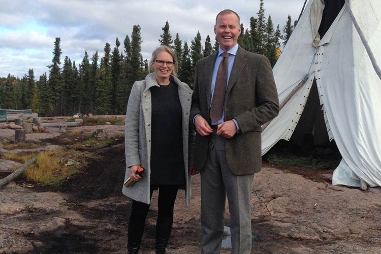 Susan Chatwood with Dalla Lana associate professor Adalsteinn Brown in the Northwest Territories in 2014