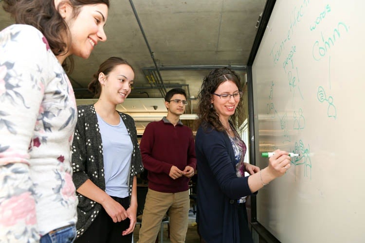 Professor Patricia Sheridan with students